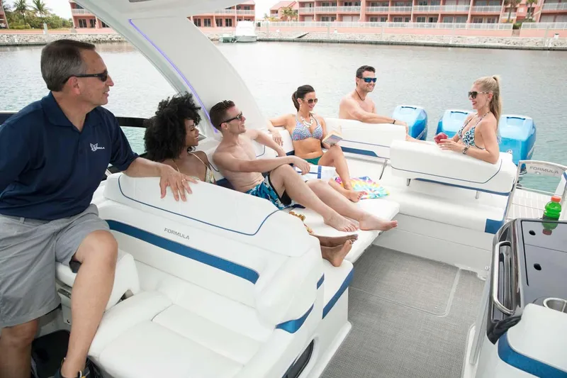 Slide: The Image of Manufacturer Provided Image: Group enjoying on a 2019 Formula 350 Crossover Bowrider OB boat. - 88