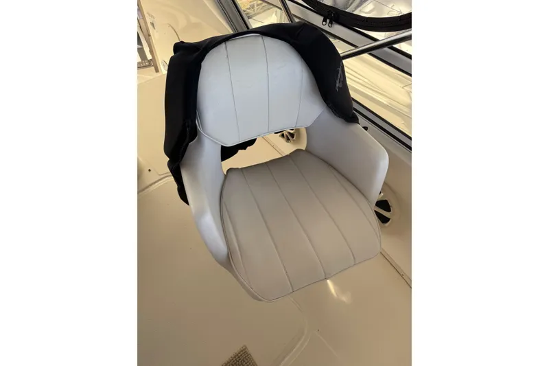 Slide: The Image of White captain's chair on 1997 Sea Ray 370 Aft Cabin boat. - 18