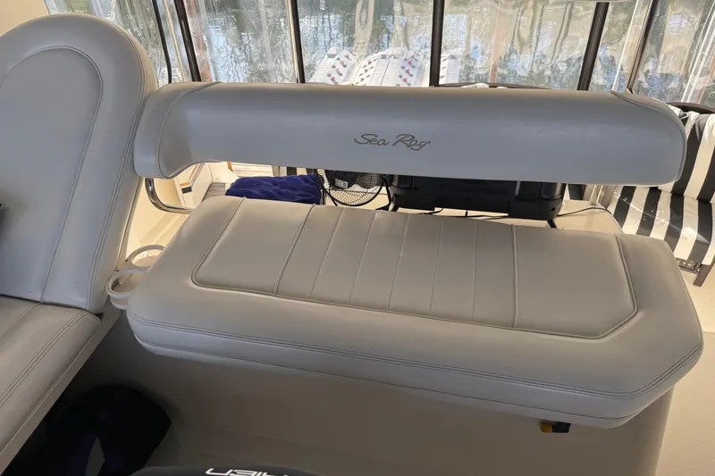 Slide: The Image of 1997 Sea Ray 370 Aft Cabin interior with white leather seating. - 20