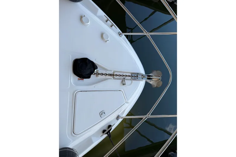 Slide: The Image of 1997 Sea Ray 370 Aft Cabin boat deck with anchor and railing. - 22