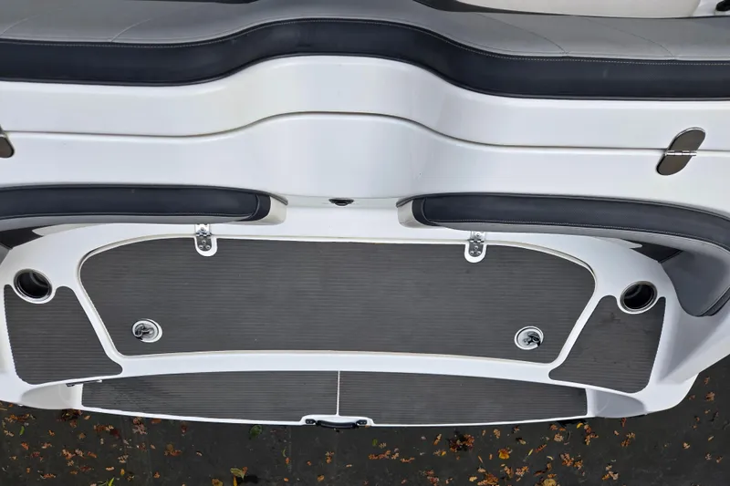 Slide: The Image of 2013 Yamaha Boats 212X swim platform with cushioned seating and sleek design. - 5