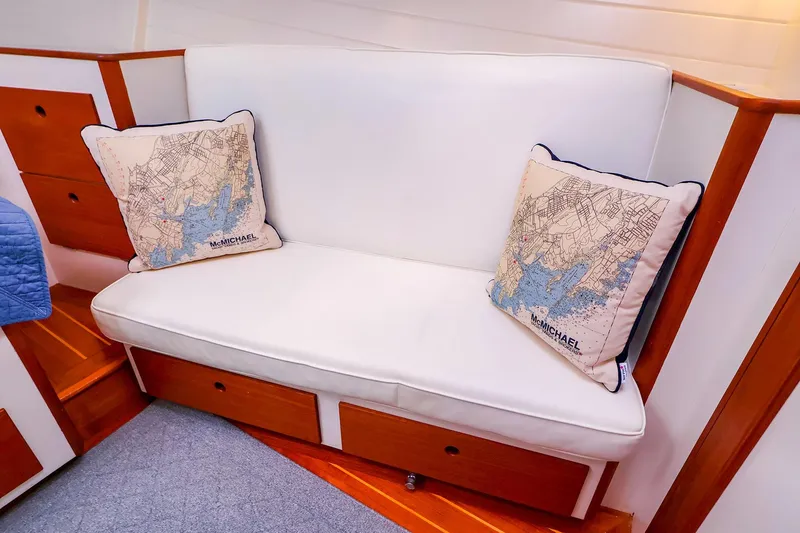 Slide: The Image of Interior of 2005 New England Boatworks Downeast Sedan with map-themed cushions. - 31