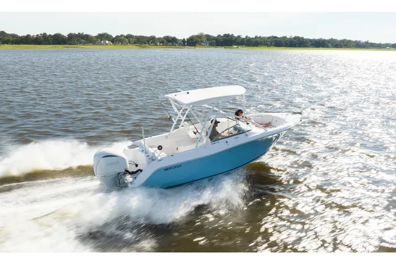 The Image of 2026 Sea Fox 228 Traveler boat cruising on a sunny lake. - 1