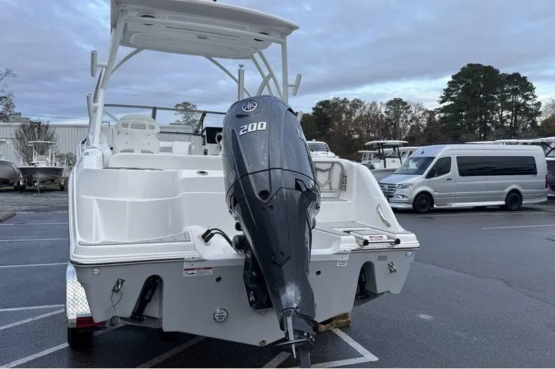 Slide: The Image of 2026 Sea Fox 228 Traveler boat with Yamaha 200 outboard motor in parking lot. - 6