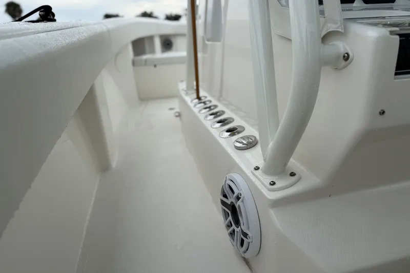 Slide: The Image of 2022 SeaVee 270Z boat interior with rod holders and speaker detail. - 22