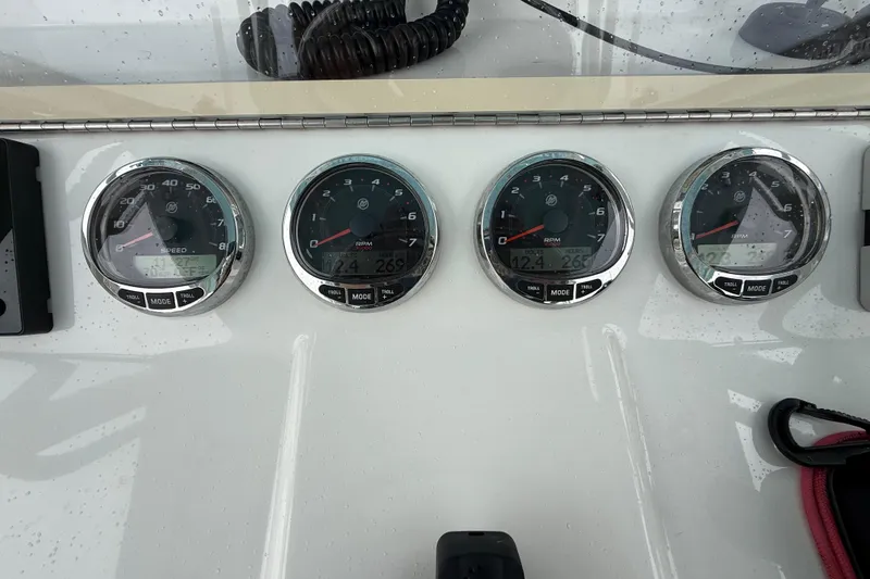 Slide: The Image of Dashboard of 2022 SeaVee 270Z boat with speed and RPM gauges. - 35