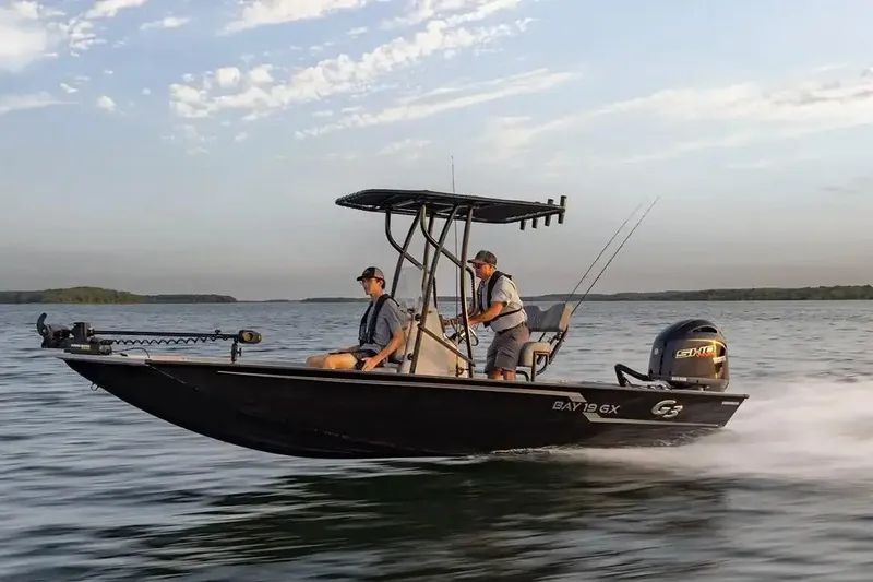 Slide: The Image of Manufacturer Provided Image: 2026 G3 Bay 19 GX boat speeding on a lake with two people onboard. - 6