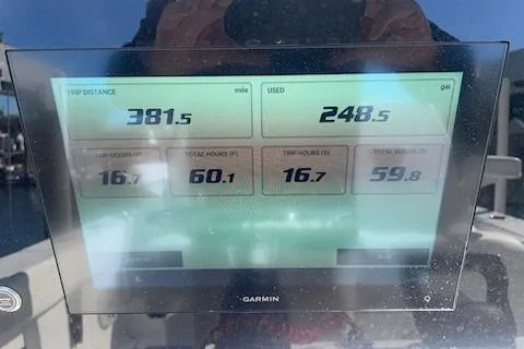 Slide: The Image of Display screen on 2025 Sportsman Heritage 261 Center Console showing trip and fuel data. - 5