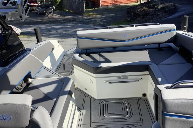 Slide: The Image of 2022 Cobalt R6 Surf boat interior with gray seating and modern design. - 7