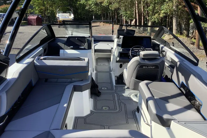 Slide: The Image of 2022 Cobalt R6 Surf boat interior with modern seating and sleek design. - 8