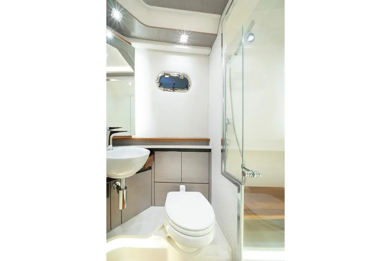 Slide: The Image of Manufacturer Provided Image: Luxurious bathroom in 2024 Tiara Yachts 48 LS, featuring modern fixtures and elegant design. - 18