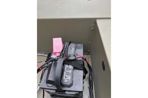 Slide: The Image of Battery setup in a 2025 Tracker Grizzly 1754 AWL boat. - 9
