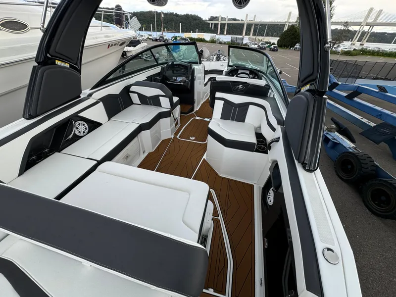 Slide: The Image of 2022 Monterey 258 Super Sport boat with sleek interior and modern design. - 11