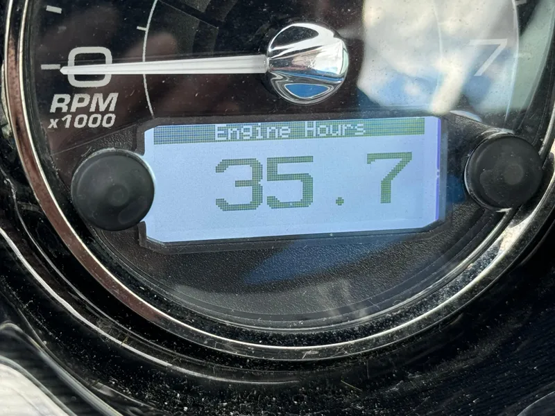 Slide: The Image of 2022 Monterey 258 Super Sport engine hours display showing 35.7 hours. - 27