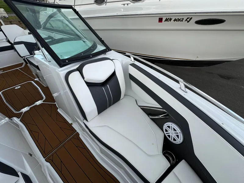 Slide: The Image of 2022 Monterey 258 Super Sport boat interior with sleek seating and modern design. - 36