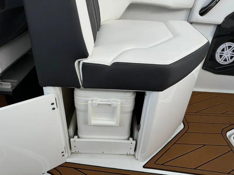Slide: The Image of 2022 Monterey 258 Super Sport boat seat with storage compartment and cooler. - 45