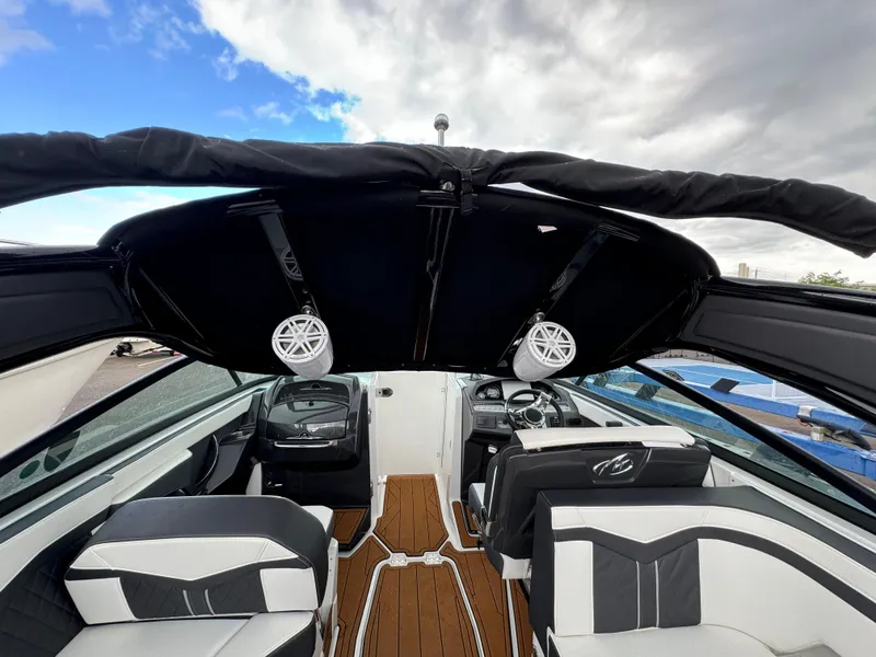 Slide: The Image of 2022 Monterey 258 Super Sport boat interior with sleek seating and modern design. - 48