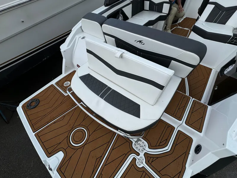 Slide: The Image of 2022 Monterey 258 Super Sport boat with stylish seating and teak-style deck. - 5
