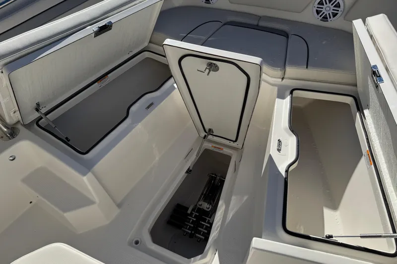 Slide: The Image of 2026 Sailfish 252 CC boat interior with seating and Yamaha engines. - 23