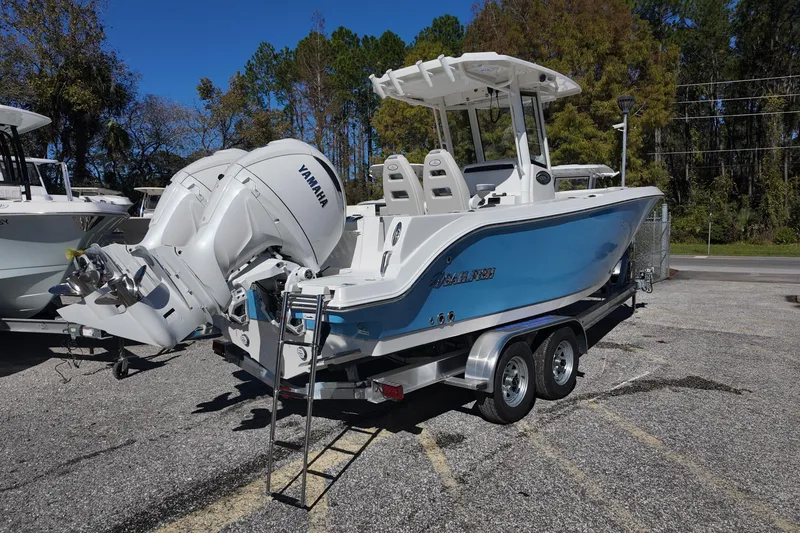Slide: The Image of 2026 Sailfish 252 CC boat with dual Yamaha engines on a trailer. - 6