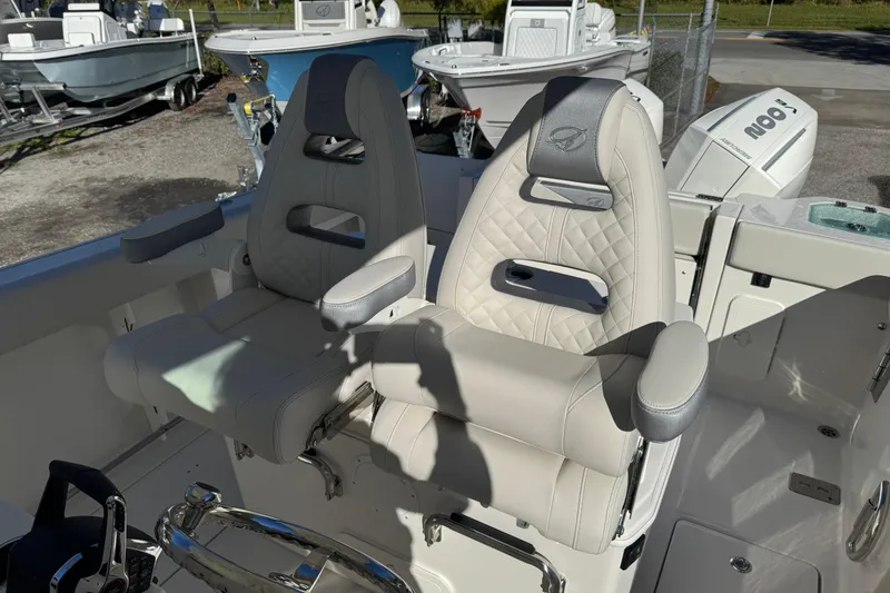 Slide: The Image of 2026 Sailfish 272 SE CC boat interior with toilet and sink. - 14