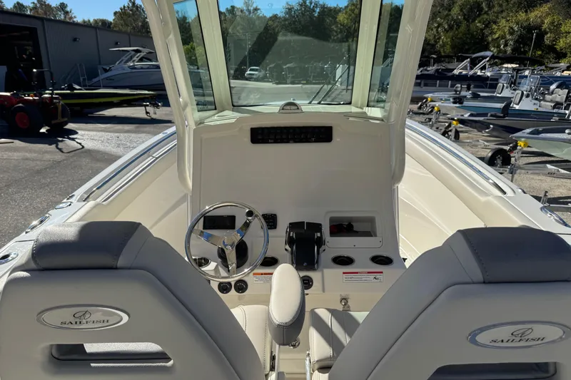 Slide: The Image of 2026 Sailfish 272 SE CC boat with dual engines, spacious deck, and modern design. - 17