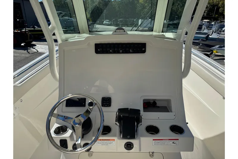Slide: The Image of 2026 Sailfish 272 SE CC boat interior with sink and storage compartments. - 18