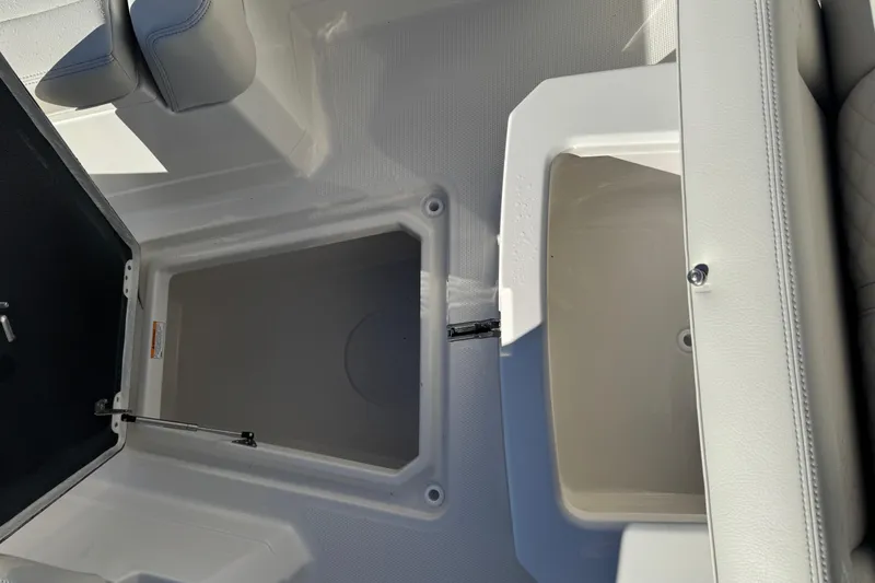 Slide: The Image of Interior view of 2026 Sailfish 272 SE CC boat, showcasing storage compartments. - 21