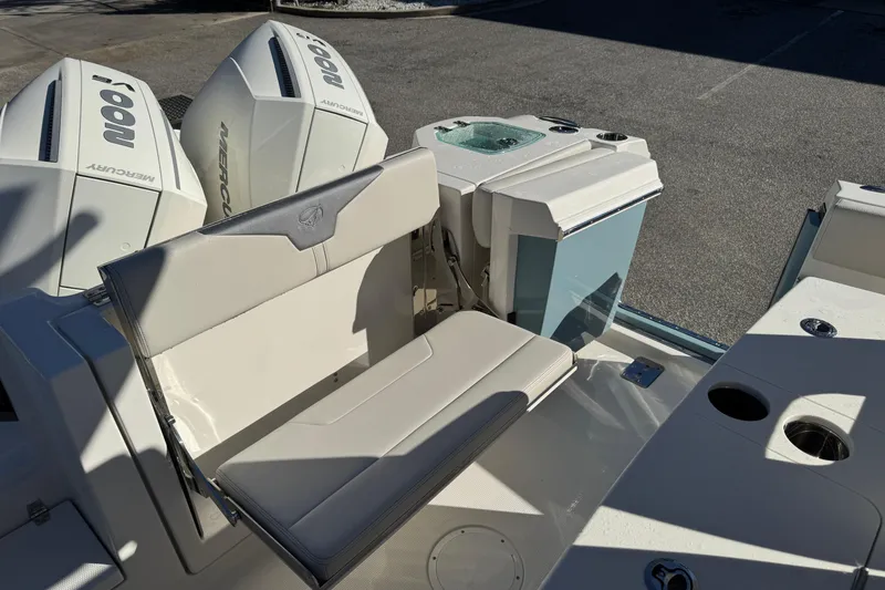 Slide: The Image of 2026 Sailfish 272 SE CC boat storage compartments, open and ready for use. - 22