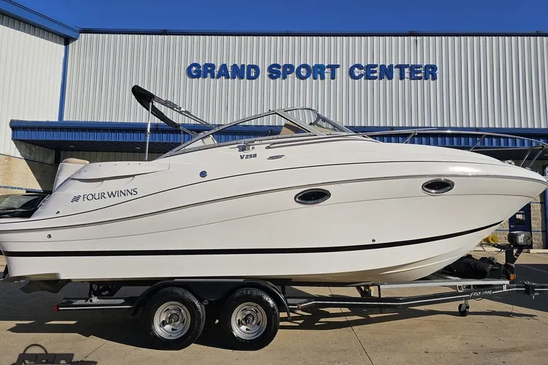 Slide: The Image of 2008 Four Winns V258 boat on trailer at Grand Sport Center. - 3