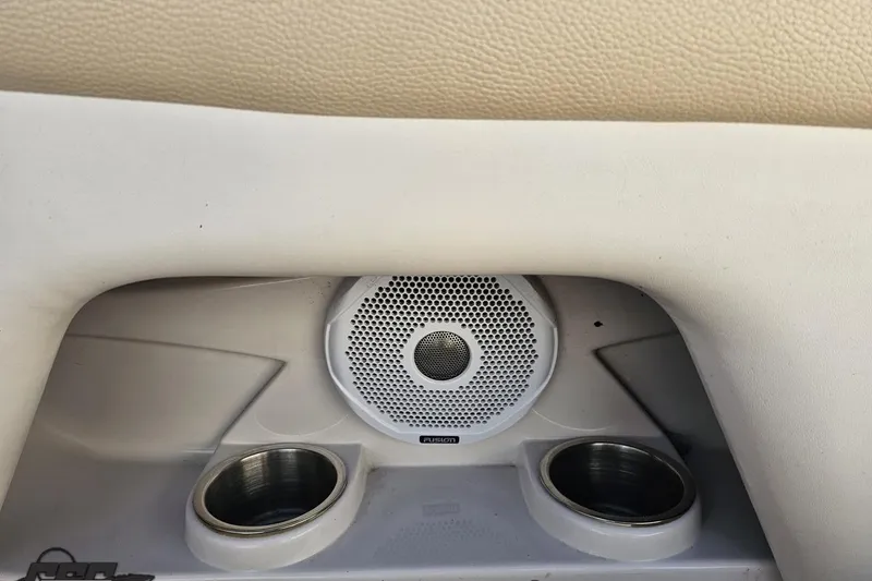 Slide: The Image of 2008 Four Winns V258 boat interior with speaker and cup holders. - 33