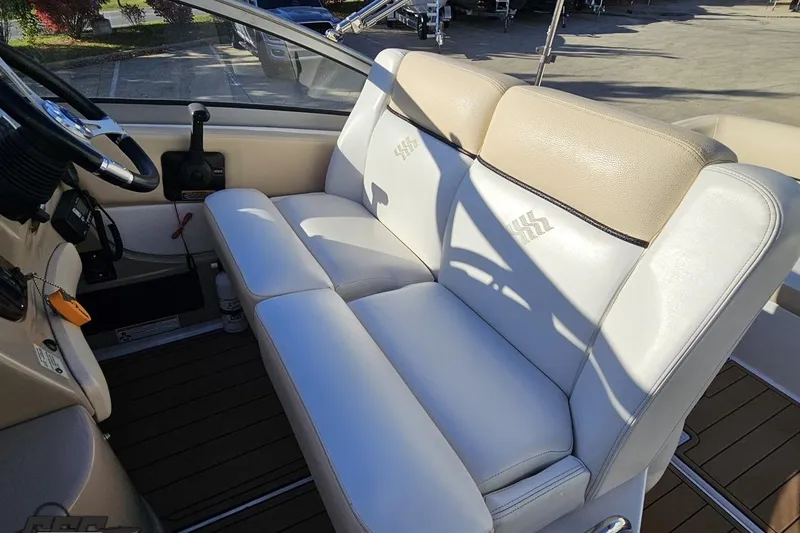 Slide: The Image of 2008 Four Winns V258 boat interior with beige and white seating. - 41