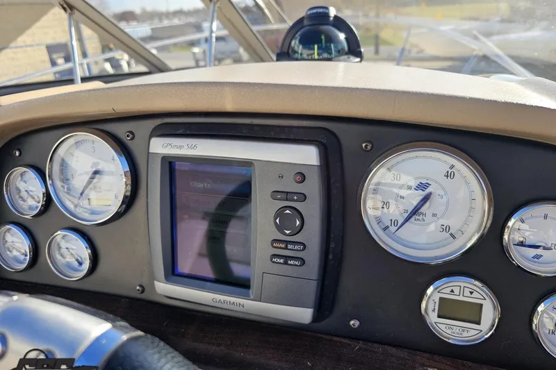 Slide: The Image of Dashboard of 2008 Four Winns V258 boat with Garmin GPS and gauges. - 48