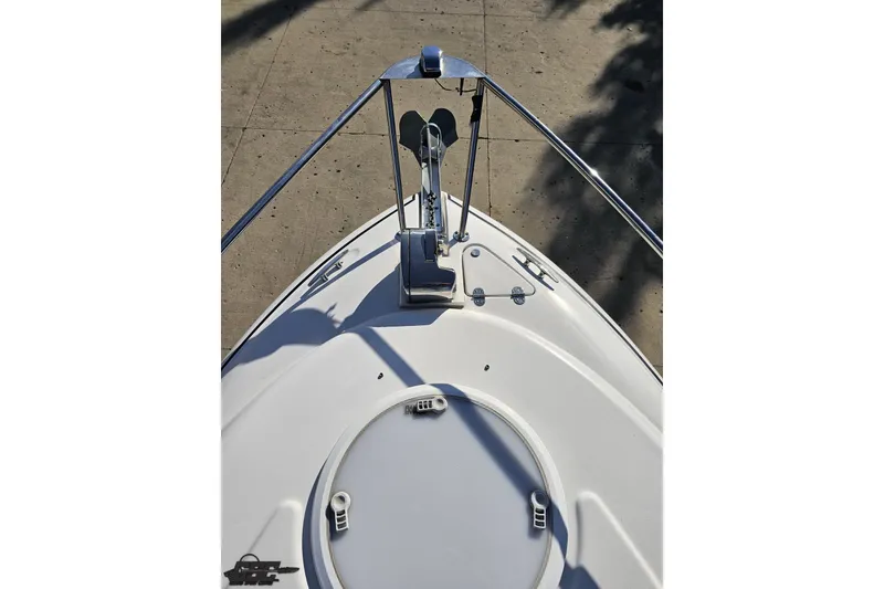Slide: The Image of 2008 Four Winns V258 boat bow with anchor and hatch, viewed from above. - 52