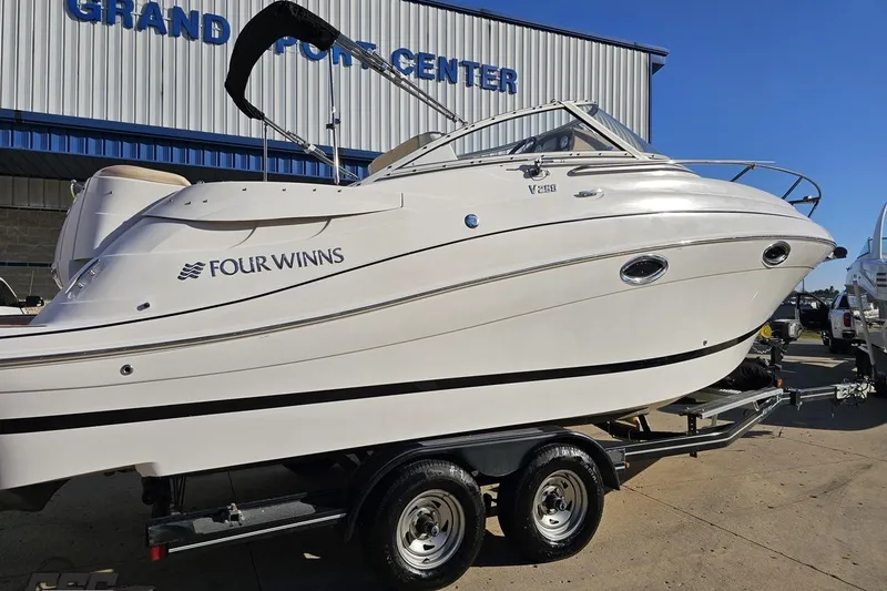 Slide: The Image of 2008 Four Winns V258 boat on trailer at Grand Port Center. - 7