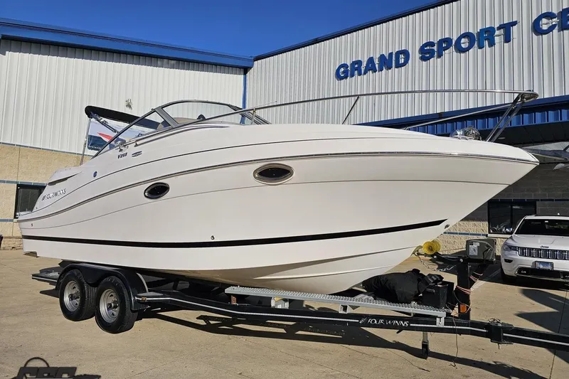 Slide: The Image of 2008 Four Winns V258 boat on trailer at Grand Sport Center. - 9