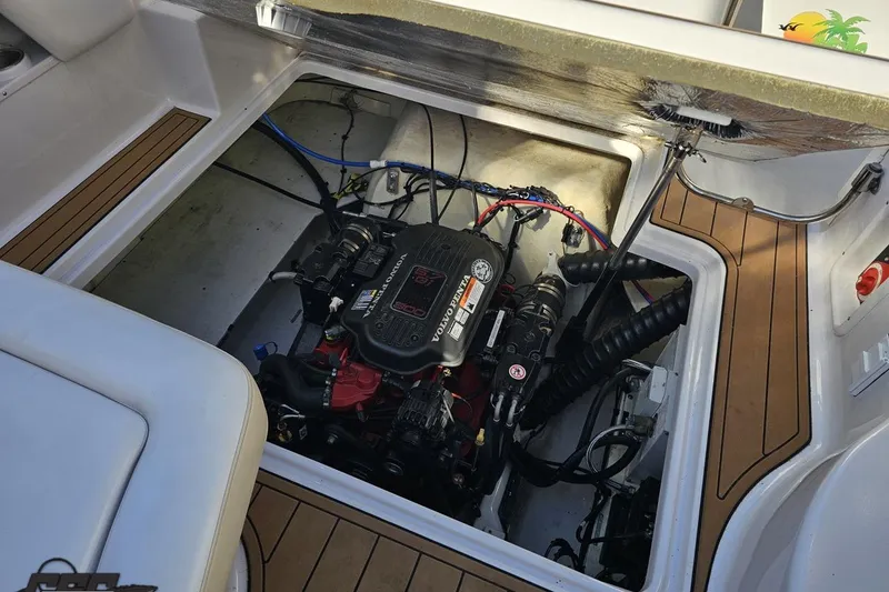 Slide: The Image of 2008 Four Winns V258 boat engine compartment with Volvo Penta engine, open hatch view. - 91