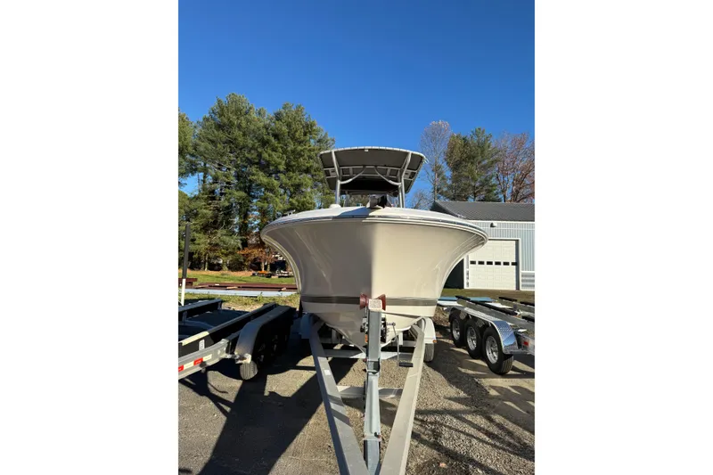 Slide: The Image of 2007 Wellcraft 232 Fisherman boat on trailer in indoor storage facility. - 7