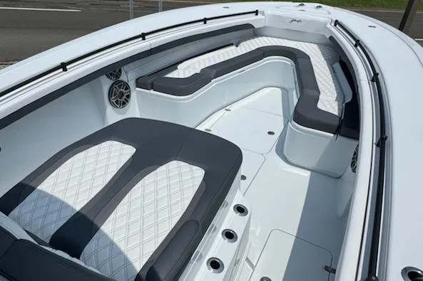 Slide: The Image of 2026 Yellowfin 36 Offshore boat interior with sleek seating and modern design. - 13