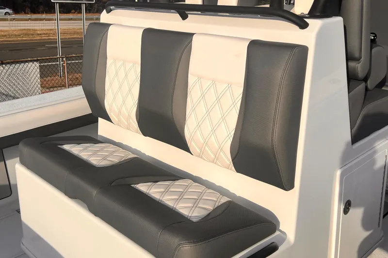 Slide: The Image of 2026 Yellowfin 36 Offshore boat seating with elegant diamond-stitched upholstery. - 9