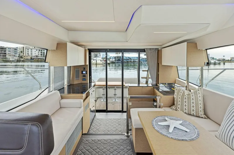 Slide: The Image of Luxurious interior of 2022 Prestige 420 yacht with modern furnishings and waterfront view. - 3