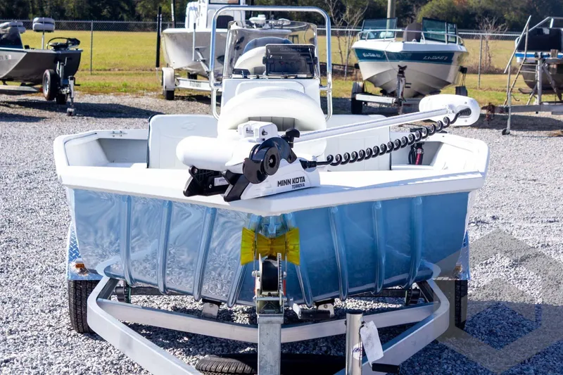 Slide: The Image of 2026 G3 Bay 20 boat with Minn Kota motor on trailer in outdoor setting. - 12