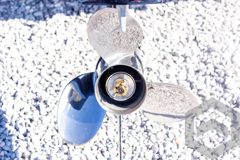 Slide: The Image of 2026 G3 Bay 20 boat propeller on gravel background, close-up view. - 15