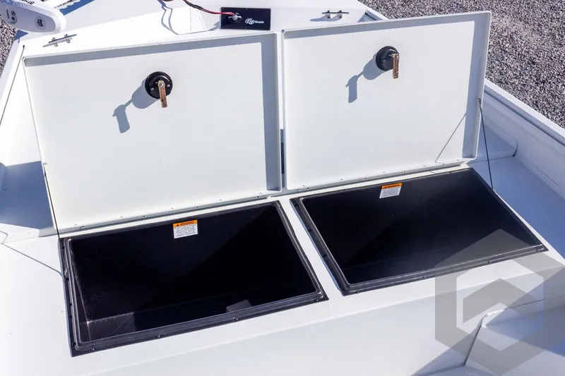 Slide: The Image of Open storage compartments on a 2026 G3 Bay 20 boat deck. - 23