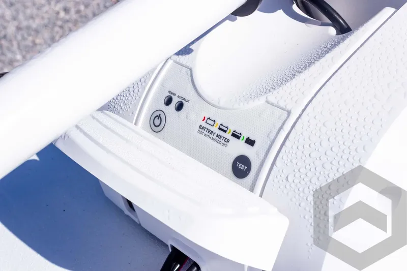 Slide: The Image of Control panel of 2026 G3 Bay 20 boat with battery meter and test button. - 26