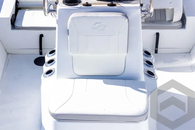 Slide: The Image of White seating area on a 2026 G3 Bay 20 boat with cup holders. - 28