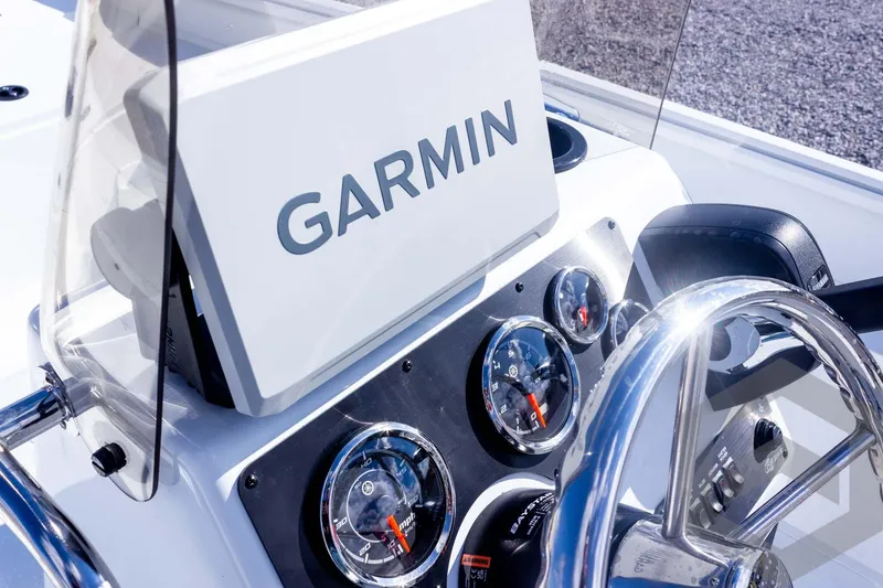 Slide: The Image of Boat dashboard with Garmin display and gauges, G3 Bay 20 model, 2026. - 31