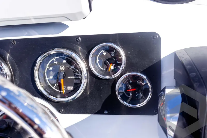 Slide: The Image of Dashboard of 2026 G3 Bay 20 boat with gauges and controls. - 32