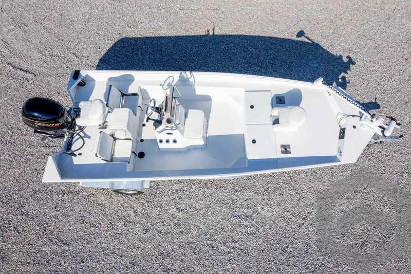 Slide: The Image of 2026 G3 Bay 20 boat, aerial view, featuring spacious deck and modern outboard motor. - 49
