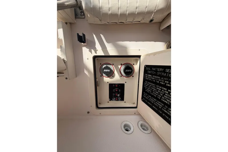 Slide: The Image of 2007 Grady-White Bimini 306 boat battery selector switch panel with instructions. - 29